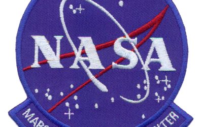 Terminando emblemas con motivos de la celebración de la NASA